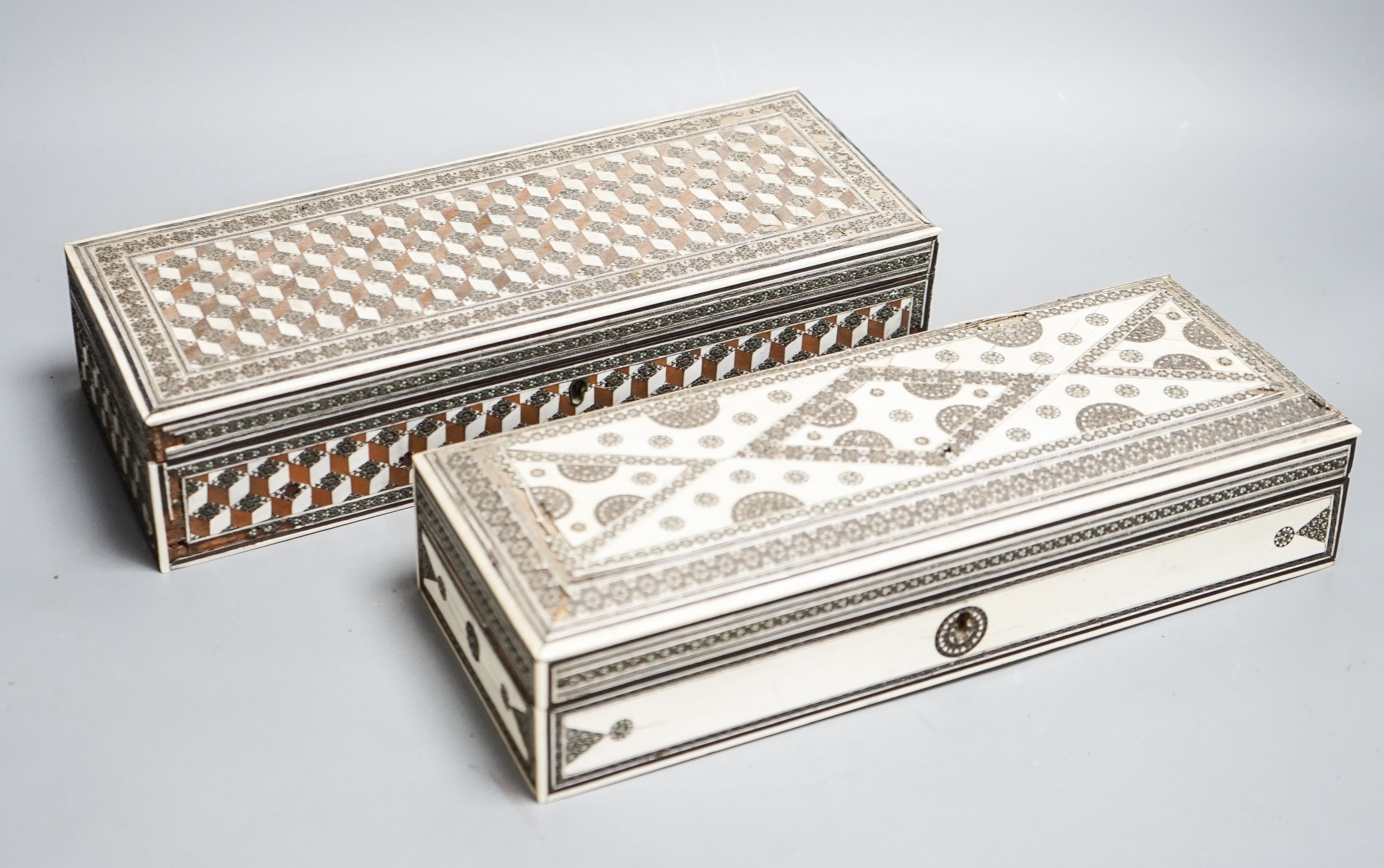 Two 19th century Indian ivory and sadeli work veneered sandalwood glove boxes (af)